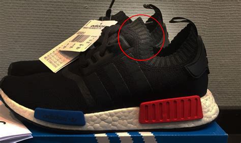 real from fake adidas nmd|NMD foot plugs.